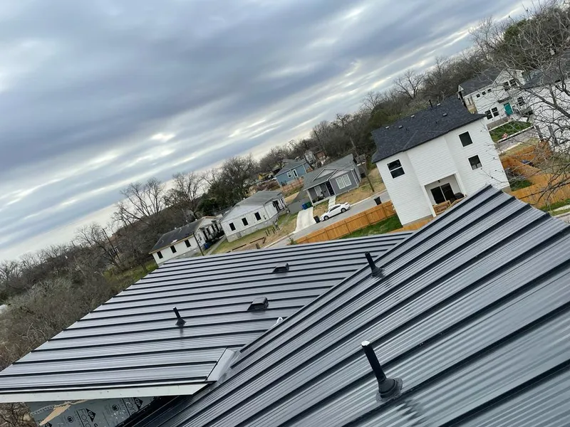 Standing seam metal roof panels with vents for Skylight Repair in New London